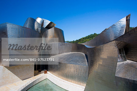 Architect Frank Gehry's Guggenheim Museum futuristic architectural design in titanium and glass at Bilbao, Basque country, Spain