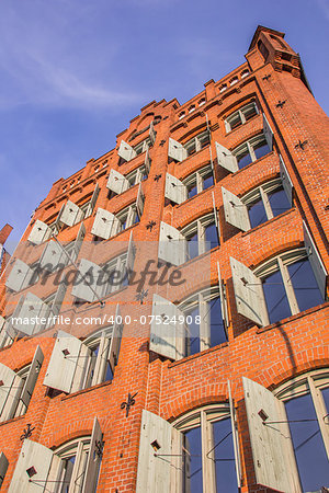 Green blinds on an old storehouse in Lubeck, Germany