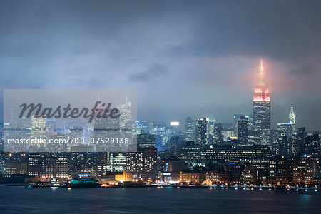 Empire State Building and Midtown at Night during a Storm, Manhattan, New York City, New York, USA