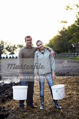 Young Couple Working On Farm, Croatia, Europe