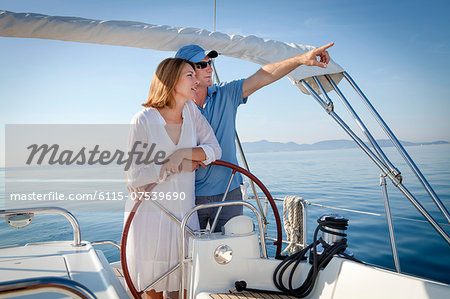 Mature couple sailing together, Adriatic Sea, Croatia