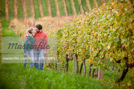 Happy couple walking in a vineyard, Osijek, Croatia