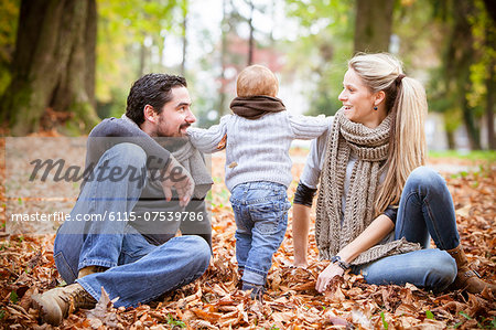 Family with one child in autumn, Osijek, Croatia
