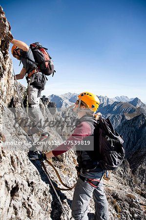 Two alpinists rock climbing, Innsbruck route, Tyrol, Austria