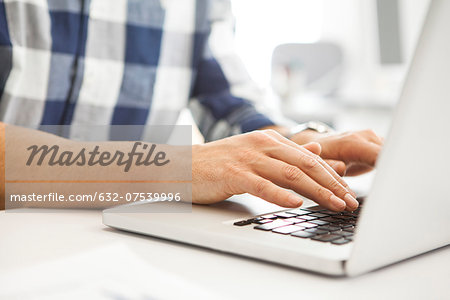 Man using laptop computer