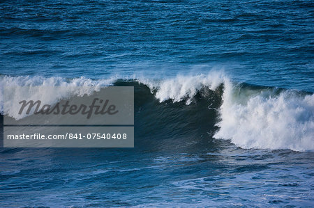 Rolling waves in the sea at Woolacombe, North Devon, UK