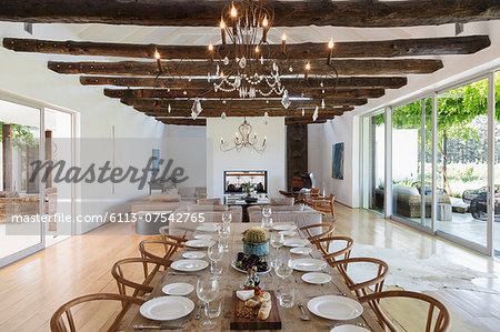 Chandelier over dining table in luxury house