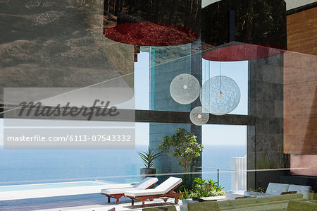 Patio of modern house overlooking ocean Patio of modern house overlooking ocean