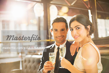 Couple drinking champagne in restaurant