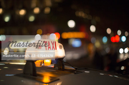 Close up of illuminated Parisian taxi light, Paris, France