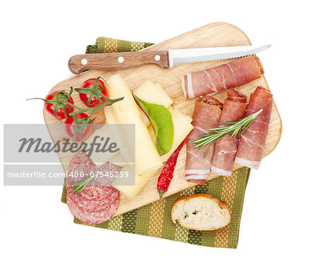 Cheese, prosciutto, bread, vegetables and spices. Isolated on white background