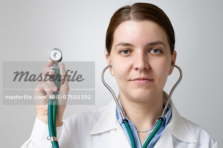 Stethoscope in the hand of a physician