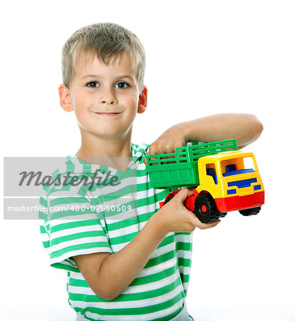 Boy holding car  isolated on white background