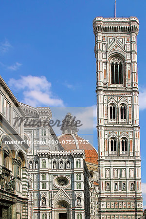 Fragment of belfry and Duomo Cathedral in Florence, Italy (vertical composition).