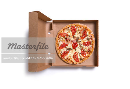 Delicious Italian pizza with ham and tomatoes in box, isolated on white background