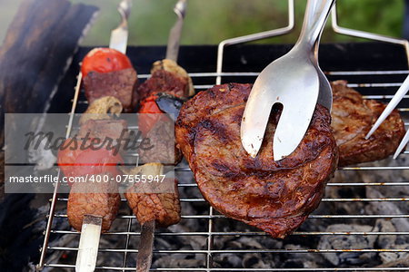 beef steak grilled on a barbecue outdoors