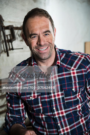 Portrait of Mature Man in Workshop