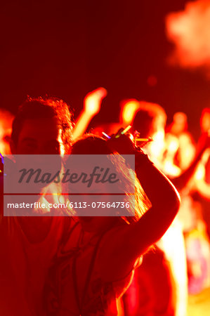 Couple dancing at music festival