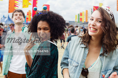 Enthusiastic friends at music festival