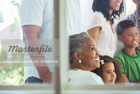 Happy multi-generation family on porch