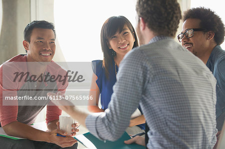 Happy creative business people in meeting Happy creative business people in meeting
