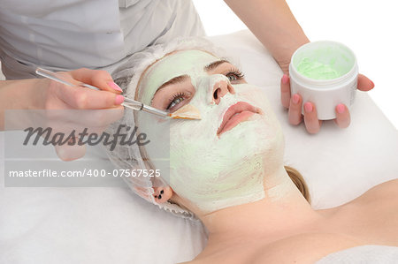beauty salon, facial mask applying using brush