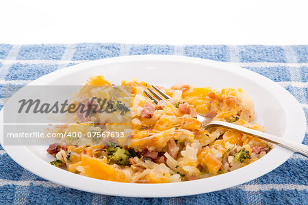 Casserole of hash brown potatoes, ham and broccoli with cheese
