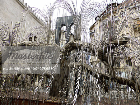 Budapest, Hungary -  The Weeping Willow Tree in Raoul Wallenberg Holocaust Memorial Park in Budapest on September 3, 2013. Made in 1991 by the famous  Hungarian artist Imre Varga, the leaves bear inscriptions with the names of the victims