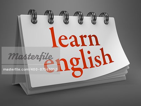 Learn English - Red Words on White Desktop Calendar Isolated on Gray Background.