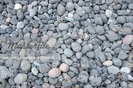 Close up of lots of pebbles at the beach