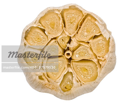 close up of roasted garlic isolated on white