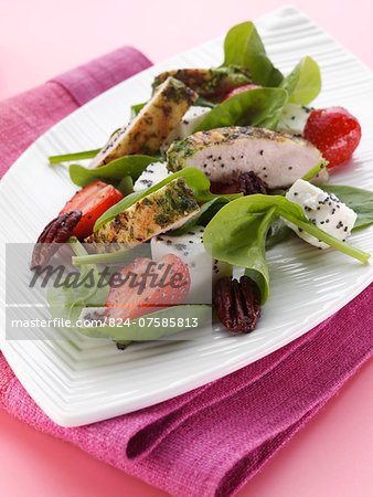 Grilled chicken with feta cheese strawberries pecans baby spinach salad