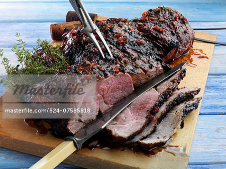 Butterflied leg of lamb marinaded and barbecued