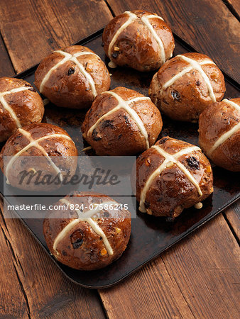 Hot cross buns on a baking sheet