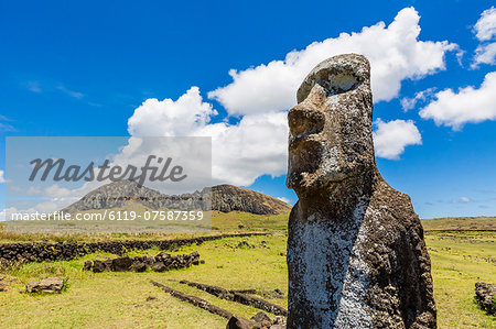 Single moai statue guards the entrance at the 15 moai restored ceremonial site of Ahu Tongariki on Easter Island (Isla de Pascua) (Rapa Nui), UNESCO World Heritage Site, Chile, South America