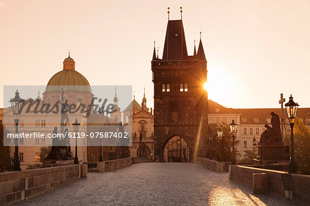 Old Town Bridge Tower and Charles Bridge at sunrise, UNESCO World Heritage Site, Prague, Bohemia, Czech Republic, Europe