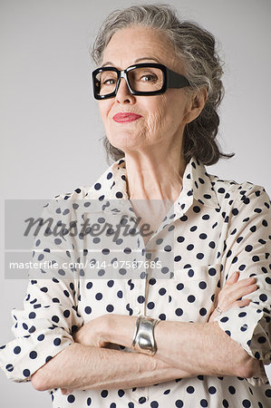 Portrait of senior woman, arms crossed