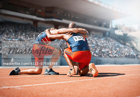 Runners huddled on track