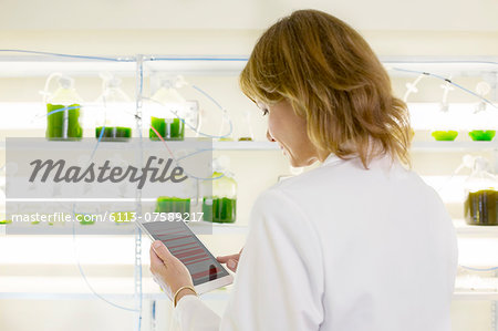 Scientist using digital tablet in laboratory Scientist using digital tablet in laboratory