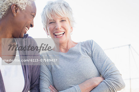 Senior women laughing outdoors