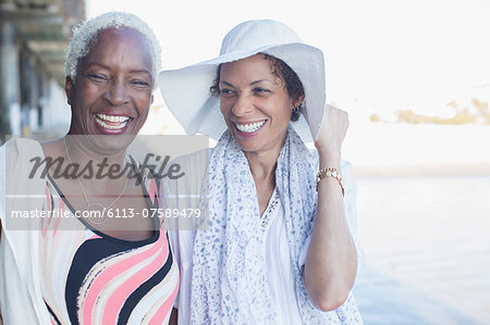 Portrait of smiling women at beach Portrait of smiling women at beach