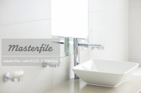 Sink in sunny modern bathroom