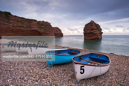 Boats pulled up on the shingle at Ladram Bay on the Jurassic Coast, UNESCO World Heritage Site, Devon, England, United Kingdom, Europe