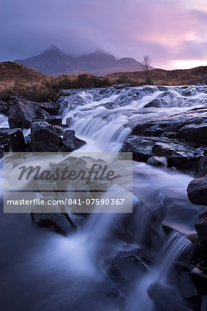 The river Allt Dearg Mor tumbling over a series of waterfalls in Glen Sligachan, Isle of Skye, Inner Hebrides, Scotland, United Kingdom, Europe