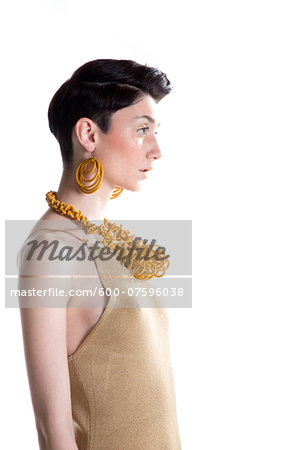 Portrait of Young Woman wearing Modern Jewellery, Studio Shot