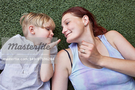 Boy blowing kiss to mother