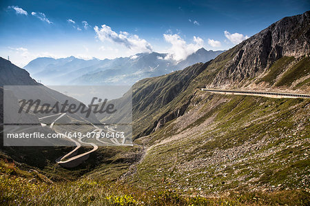 Distant view of old road to Gotthard Pass, Switzerland Distant view of old road to Gotthard Pass, Switzerland