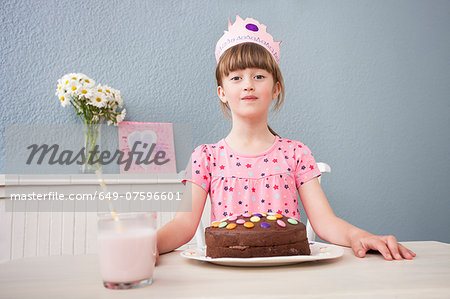 Girl with her birthday cake