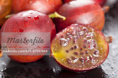 Red gooseberries, whole and halved