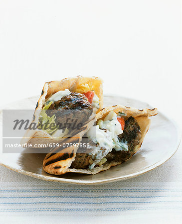 Pita bread filled with meatballs and tzatziki